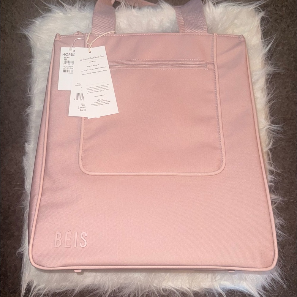 Pastel Pink Travel Bag with Textured Fabric and Padded Edges